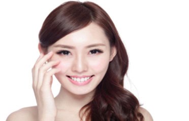 A happy looking Asian woman